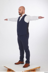 Neeo blue trousers blue vest brown oxford shoes business dressed red bow tie standing t poses white shirt whole body  jpg